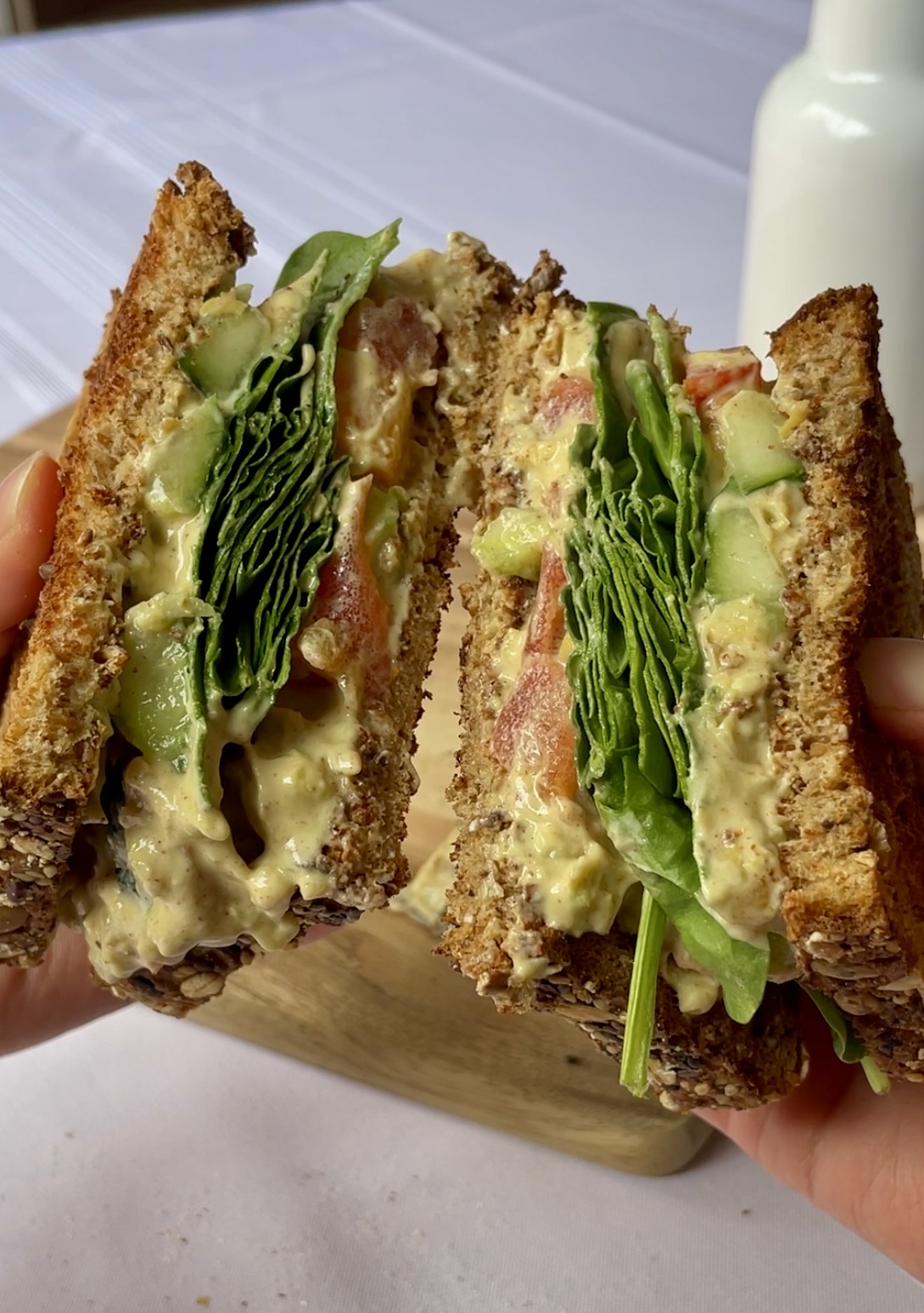 This Chickpea Salad is a filling vegetarian lunch that is high in protein and contains few ingredients. It takes 5 minutes to make and is perfect if you have veggies in your fridge! Consisting of chickpeas, greek yogurt, avocado, and veggies, this chickpea salad contains balanced ingredients to fuel your body and keep you energized!